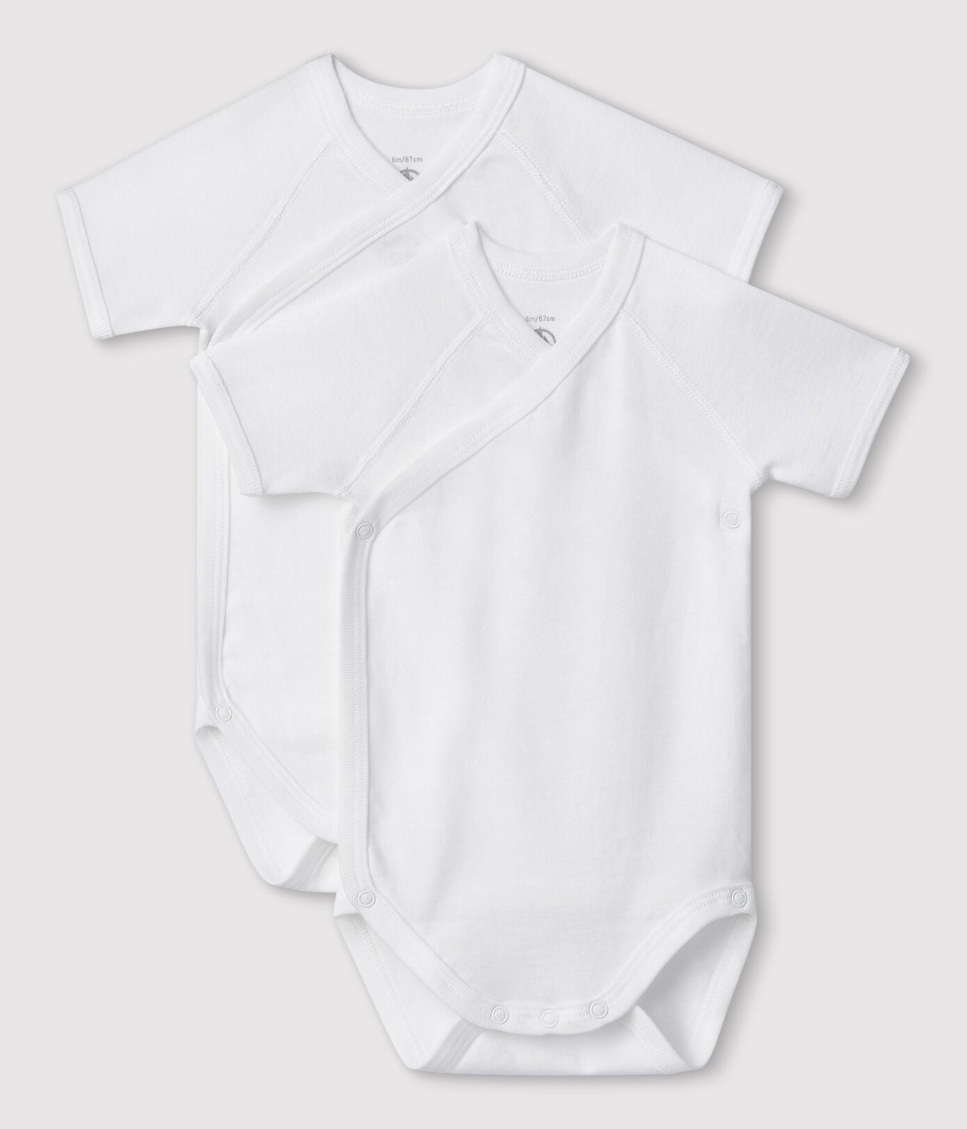 Lot de 2 bodies blancs manches courtes